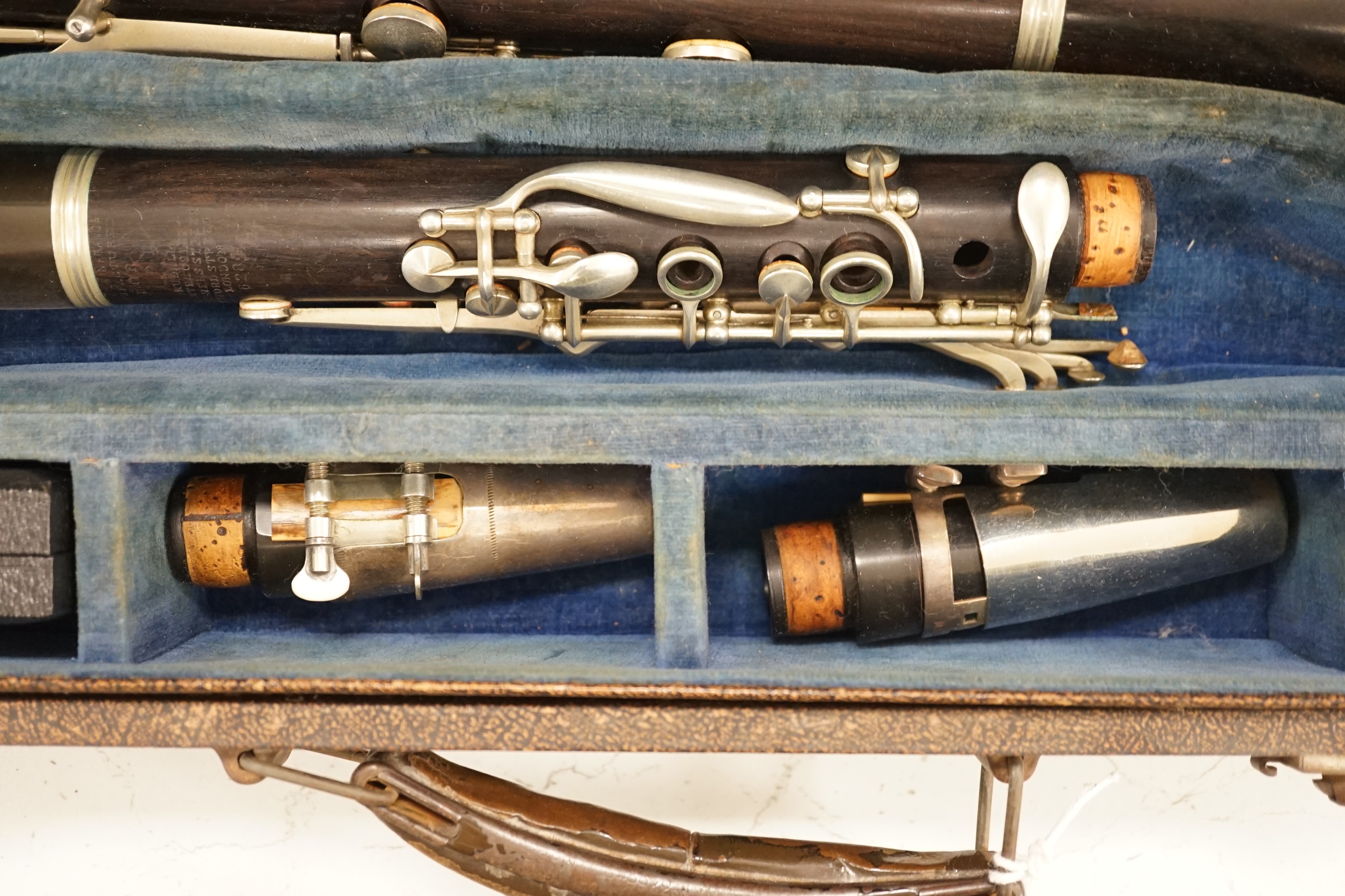 A cased pair of ebony jazz clarinets, 1920's, by Rudall, Carte & Co.